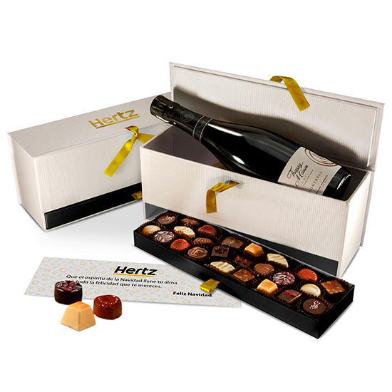 Cofre con botella de champagne y bombones premium